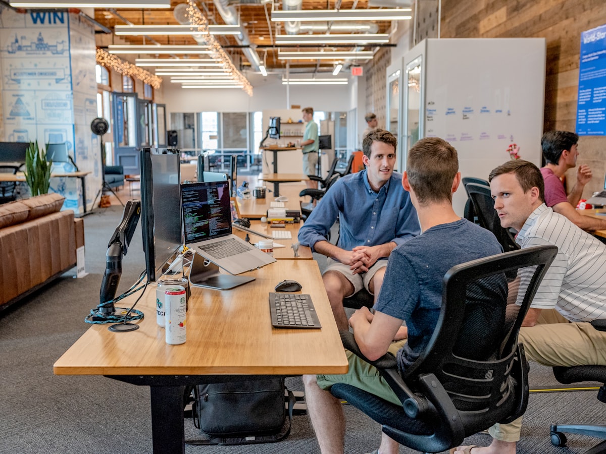 Employees at their desks in an open-plan office