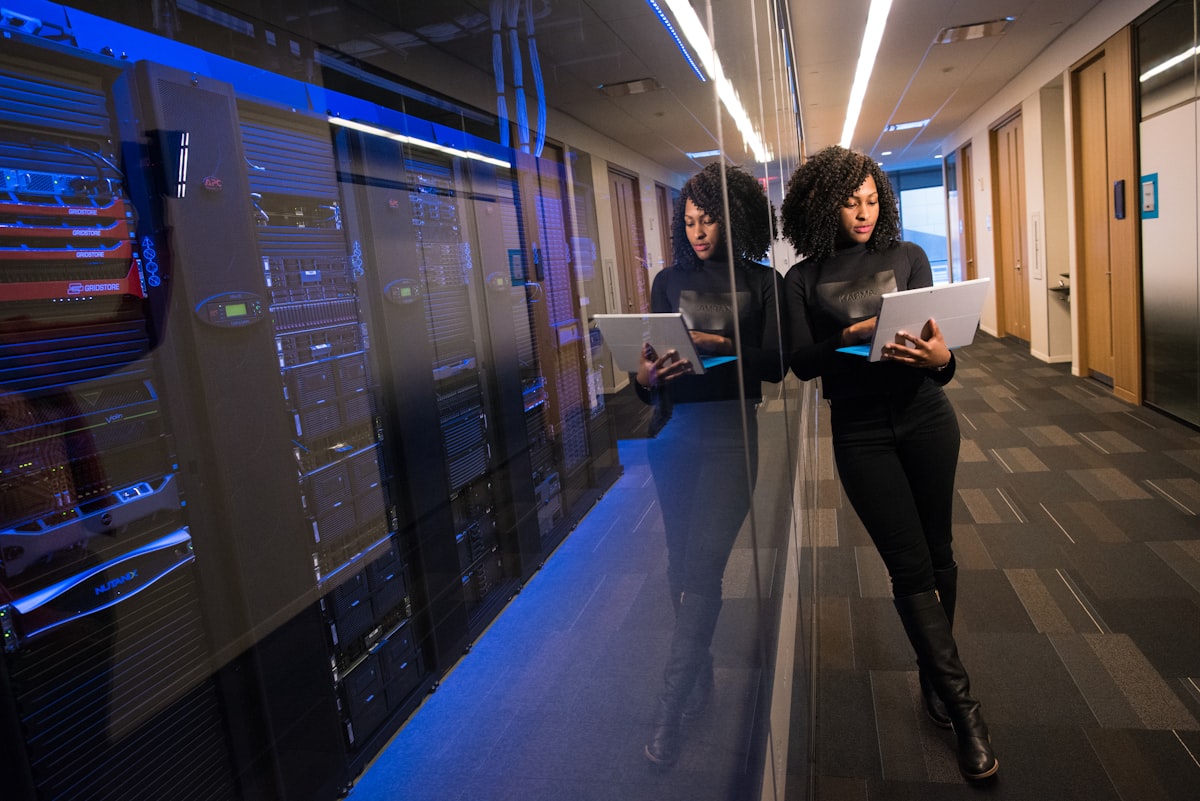 An engineer reviewing infrastructure in a secure data centre
